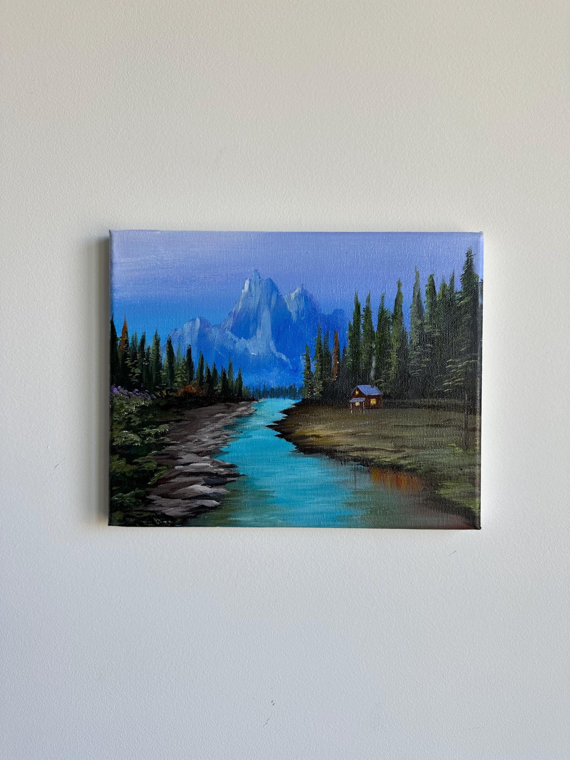 Cozy house by pine tree forest and river and mountains acrylic painting on canvas